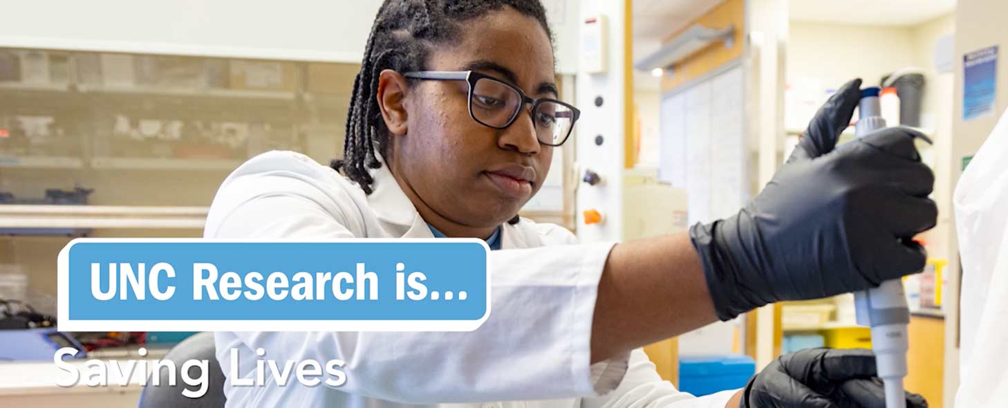 UNC Research banner - researcher in lab