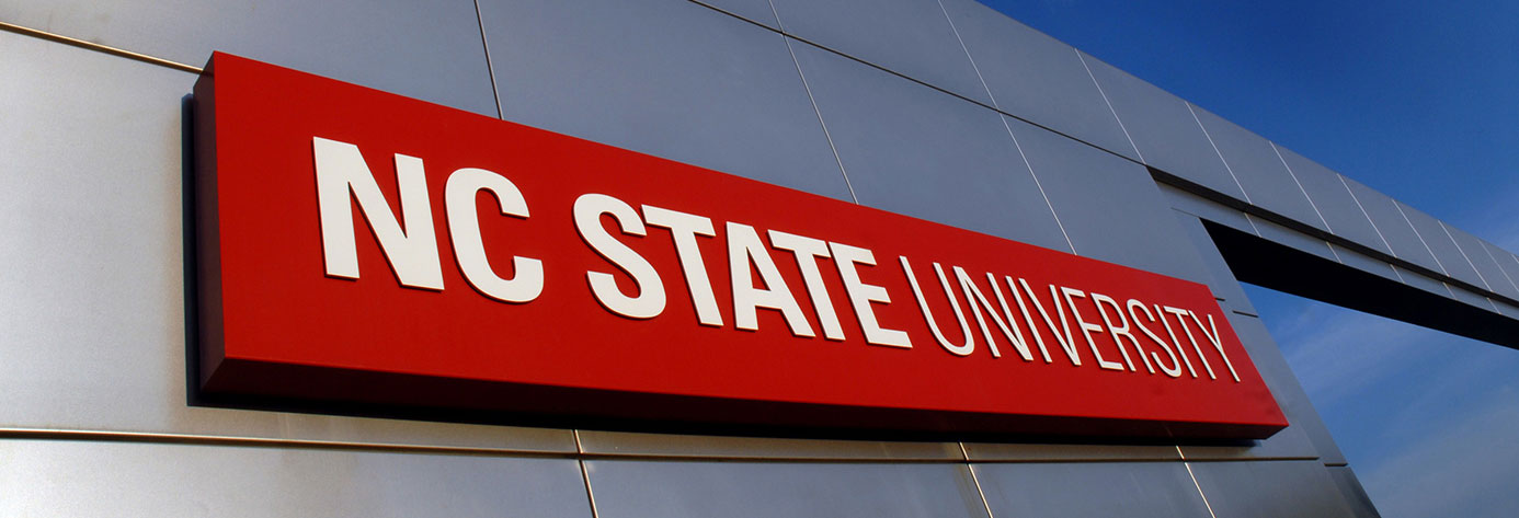 NC State sign with blue sky in background